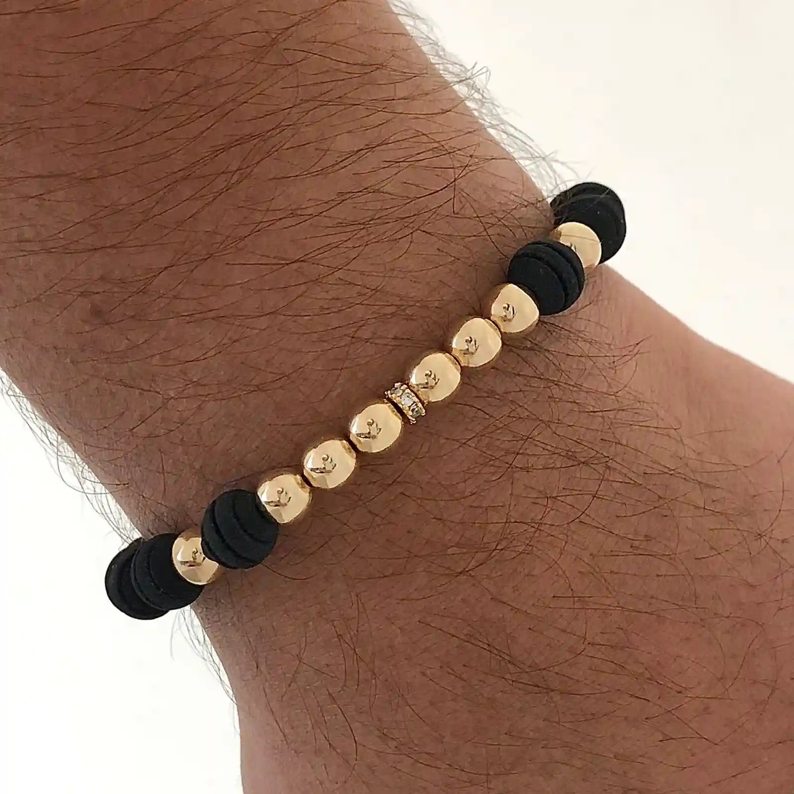 Manilla tejida con oro laminado 18K balín liso y herraje Ref: MH8