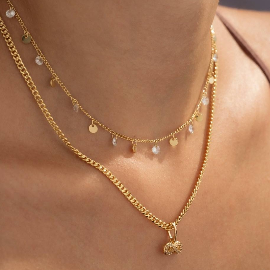 Dije oro laminado 18K símbolo de infinito con circonias Ref 22849