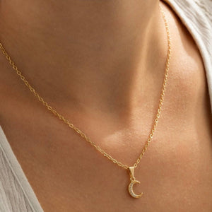 Dije oro laminado 18K media luna con circonias Ref 23166