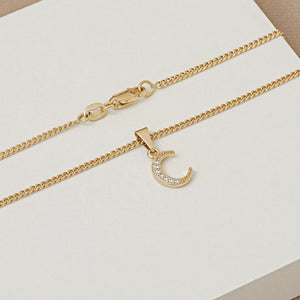 Dije oro laminado 18K media luna con circonias Ref 23166